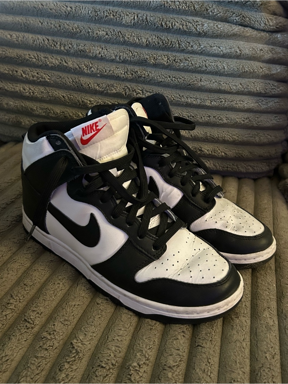 Nike Black & White Mid-Top Sneakers with Red Logo